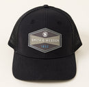 Smith & Wesson® Two-Tone Hexagon Patch Trucker Cap in Heather Black Linen